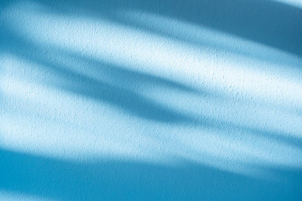 istock Wall interior background, studio, and backdrops show products. with shadow from window color white and blue light. background for text insertion and presentation of product 2150778178