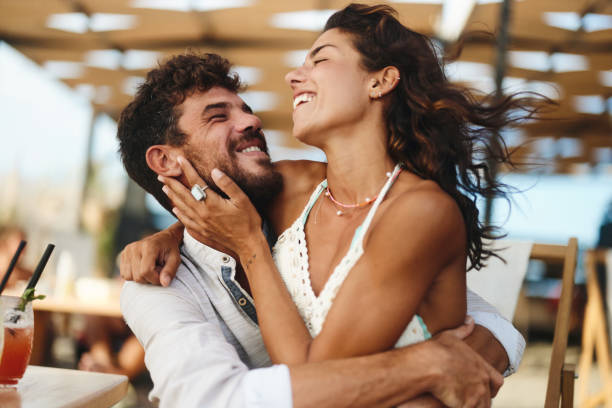 istock Young cheerful couple having fun in summer day. 2150782330