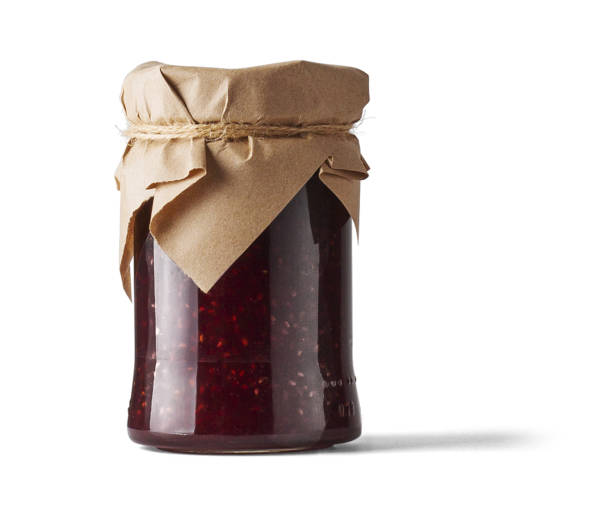istock Jar of raspberry jam isolated on white background. 2150783077