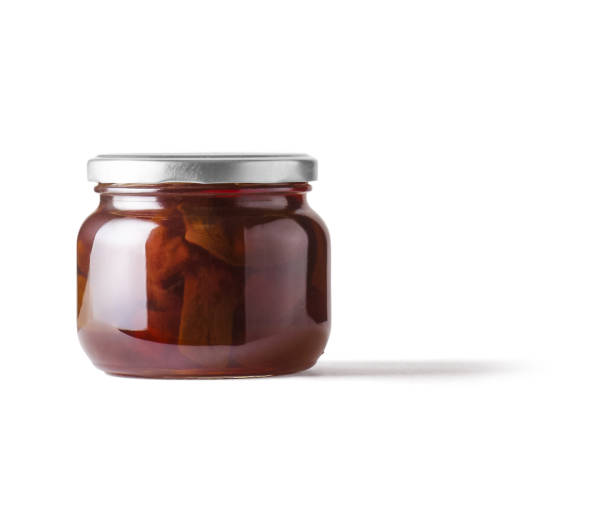 istock Fruit in a glass bottle, red colour, on white background 2150783081