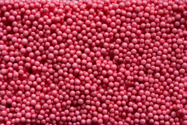 istock close up of red foam beads for the background 2150785113