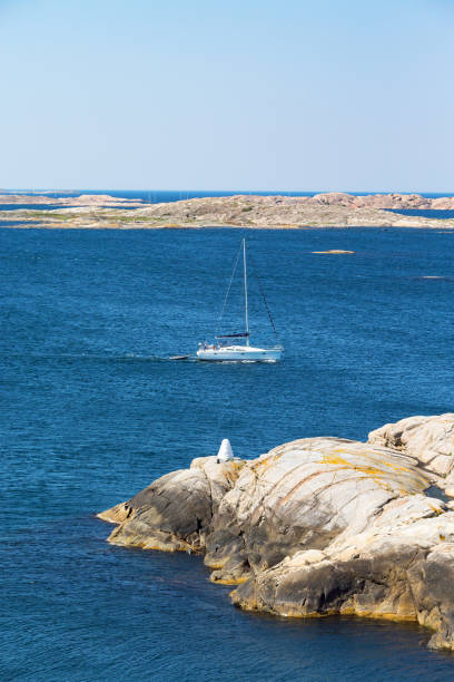 istock Sailboat sailing in rocky archipelago 2150786678