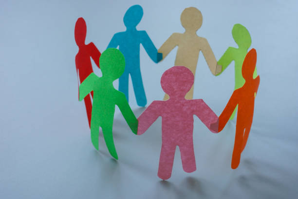 istock Circle of colored paper people. Concept of unity, diversity and teamwork. 2150788204