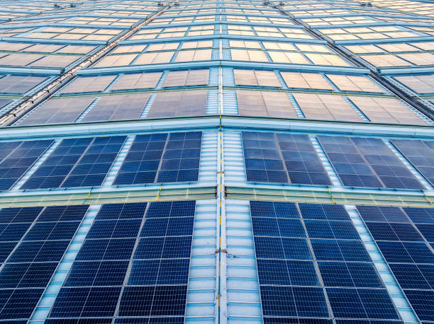istock Aerial view of neatly arranged solar panels 2150789382