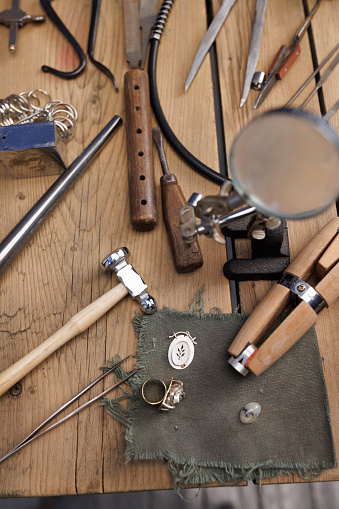 Jeweler workshop  Vintage and modern jeweler tools on rustic wooden table  Work Hand Tool  DIY