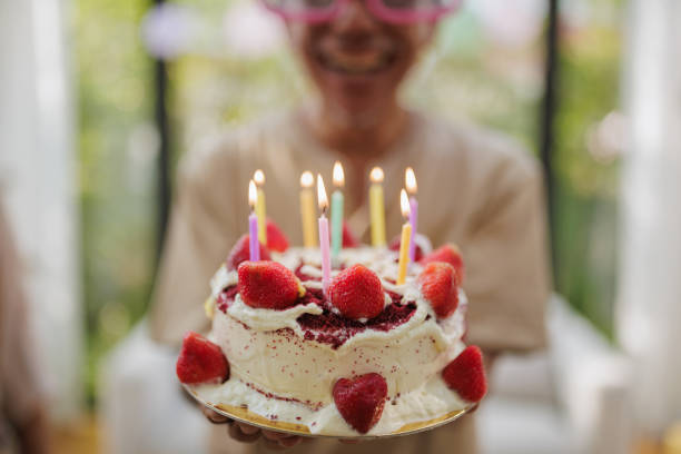 Celebration Cake with Lit Candles: A Sweet Moment Perfect for Birthdays, Anniversaries, and Special Occasions