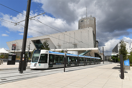 Paris, France-04 21 2024: Tramway in front of the Paris convention center building located in the Porte Maillot in the 17 th arrondissement of the French capital.