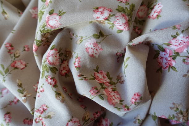 istock Folds on grey rayon fabric with old-fashioned floral print 2150792208