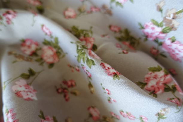 istock Soft fold on grey rayon fabric with old-fashioned floral print 2150792218