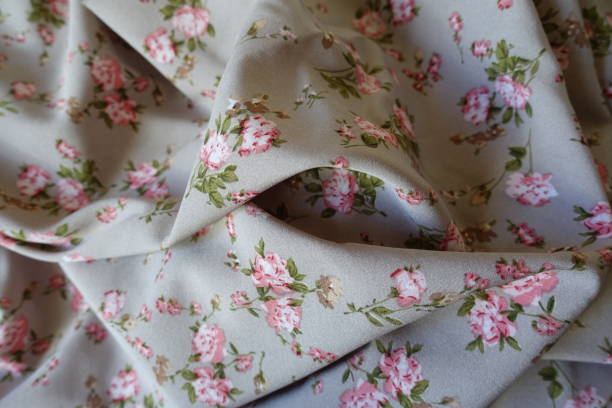 istock Rumpled grey rayon fabric with old-fashioned floral print 2150792219