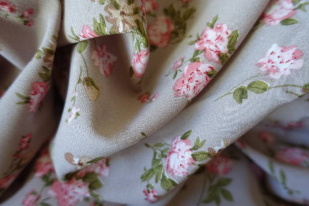istock Rippled grey rayon fabric with old-fashioned floral print 2150792223