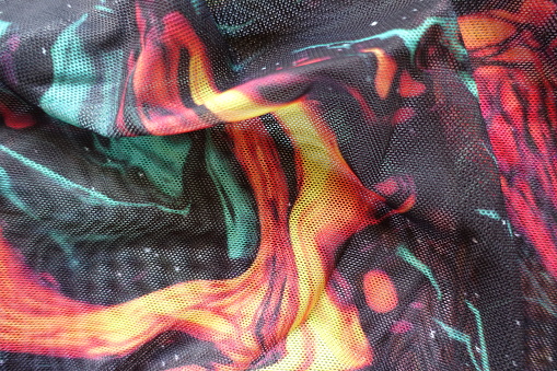 Crumpled bright and colorful polyester mesh fabric