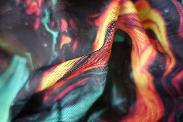 istock Soft folds on bright and colorful polyester mesh fabric 2150792300