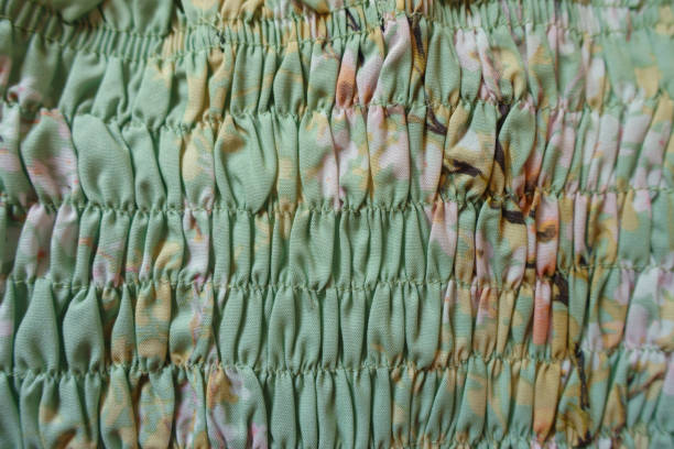 istock Close up of light mint green rayon fabric with shirring 2150792386