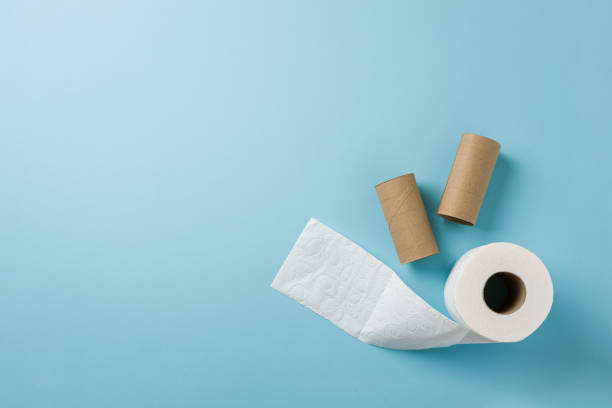 istock Top view of toilet paper roll on blue background 2150794659
