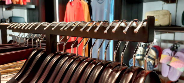 istock close up clothes hanger on clothesline in shop 2150796056