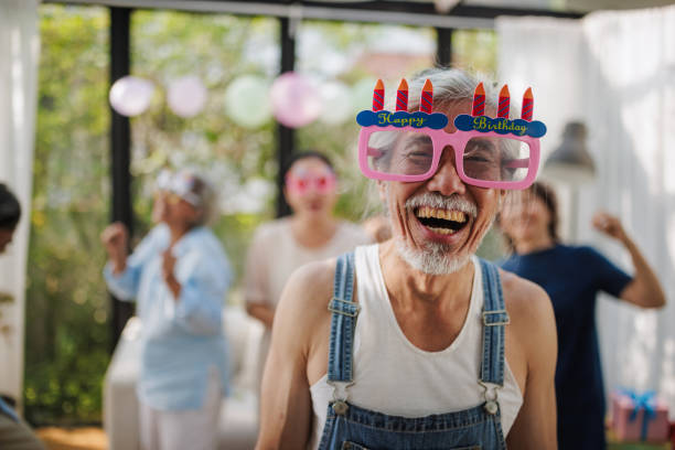 istock Silly senior man at the birthday party 2150797028