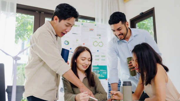 istock diversity team discussion focused on social in ESG (environment,social,governance)  for human rights topic  in a sustainable green office 2150799666
