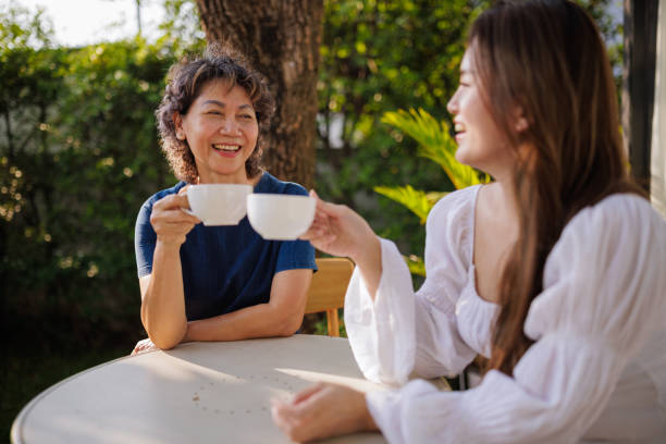 istock Mom and daughter coffee time 2150800442