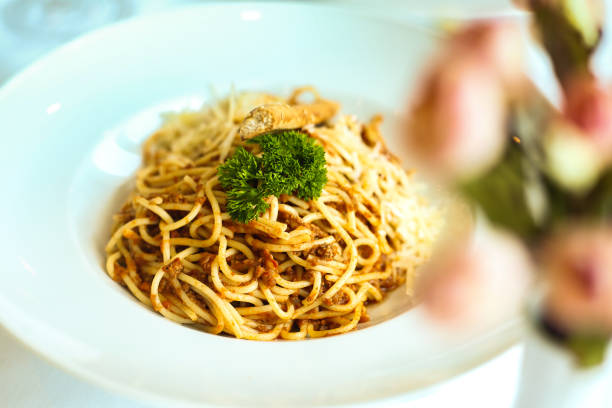 istock White Plate With Spaghetti and Broccoli Topping 2150802089