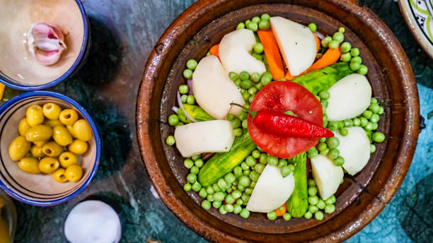 istock Preparation of a Moroccan Tagine shot from above 2150804719