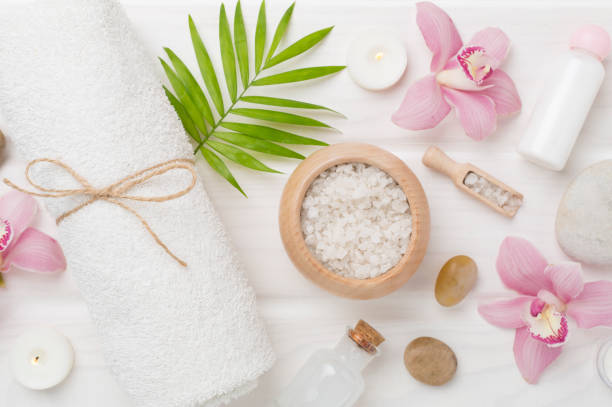 istock Composition with orchids, spa products on wooden background, top view 2150805330