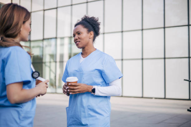 istock A picture of two female doctors on a coffee break. 2150805643