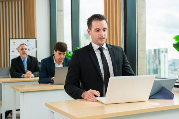 istock Successful businessman working and looking camera in a meeting room. 2150805870