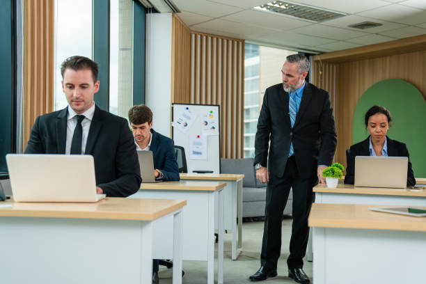 istock Successful businessman working and looking camera in a meeting room. 2150805897