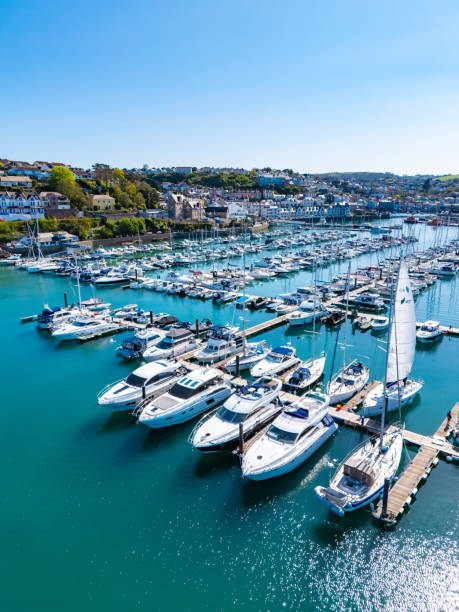 istock Brixham harbour England with sailing barges 2150806421
