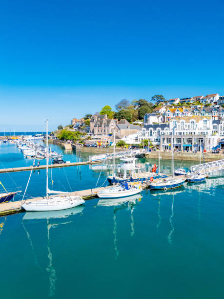 istock Brixham harbour England with sailing barges 2150806450