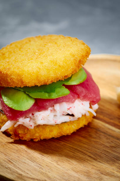 istock sushi menu with burger made from rice and tuna, avocado, light cheese and nori 2150808363