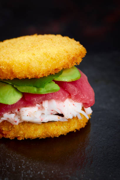 istock sushi menu with burger made from rice and tuna, avocado, light cheese and nori 2150808405
