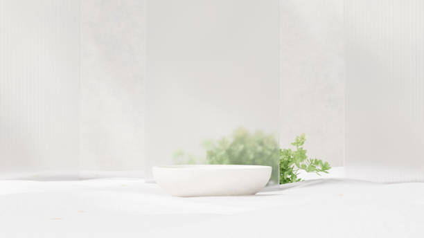 istock Empty podium display made of white stone and leaf for showcasing merchandise 2150808468