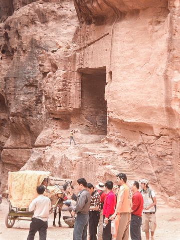 Wadi Musa, Jordan, April 18, 2008 : Numerous tourists in the square in front of The Treasury Al Khazn in the Petra Historical Reserve in the Wadi Musa city in Jordan