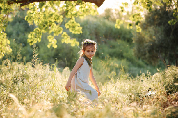 istock Cute little girl having fun time in the nature 2150814830