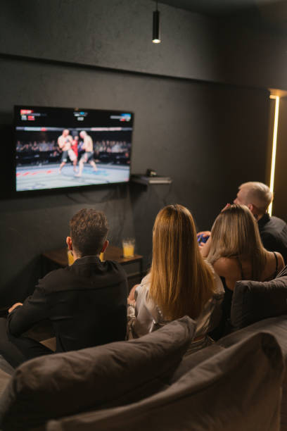 istock Friends enjoys light alcoholic drinks while playing video games 2150818173