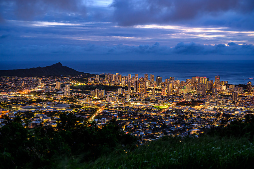 View from the Tantalus Lookout to the skyline of Honolulu and Diamond Head at night\n - Oahu, Hawaii