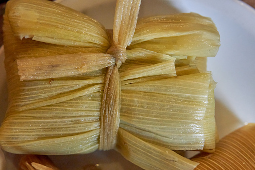 close-up of a tamale tied in the middle. Typical food from Jujuy, Argentina