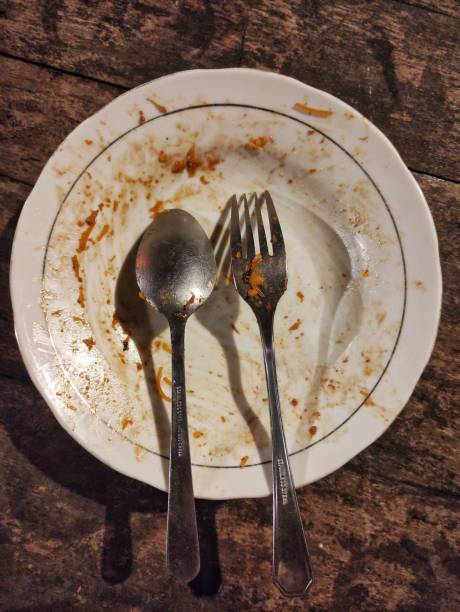 istock dirty dishes after eating 2150825554