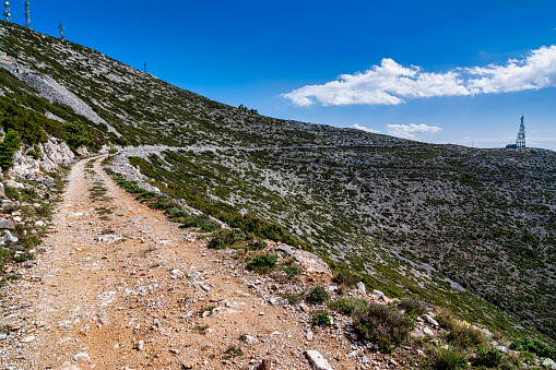 Penteli mountain country road at Attica, Greece. Situated north of Athens city center, mount Penteli is famous for its white marble, which was used to build the Acropolis.