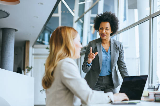 istock Conversational business meeting with diverse team 2150826057
