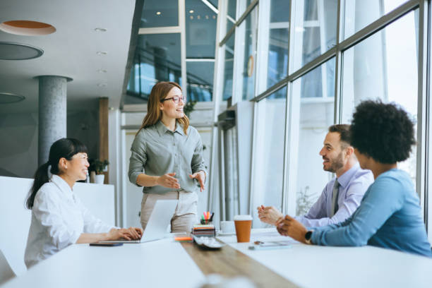 istock Vibrant office meeting with the animated speaker 2150826074