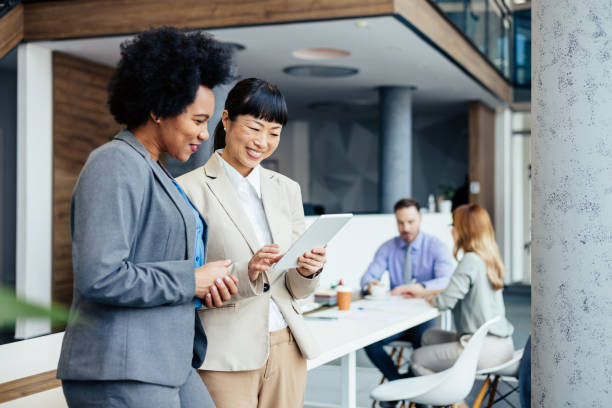 istock Businesswoman applauding colleague's presentation 2150826172