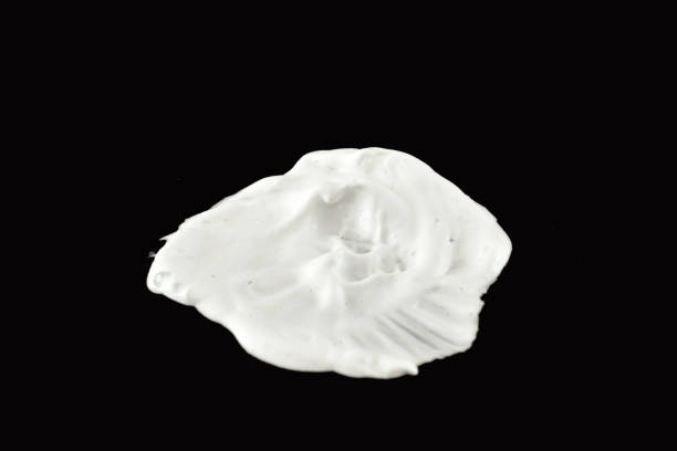 istock Shaving foam stain on a black background. 2150826548