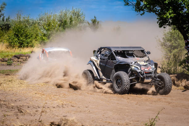istock Cool view on hard ride UTV on sandy track. 4x4, extreme, adrenalin. 2150828310