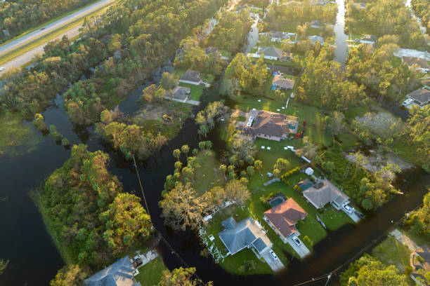 istock Surrounded by hurricane rainfall flood waters homes in Florida residential area. Aftermath of natural disaster 2150829295