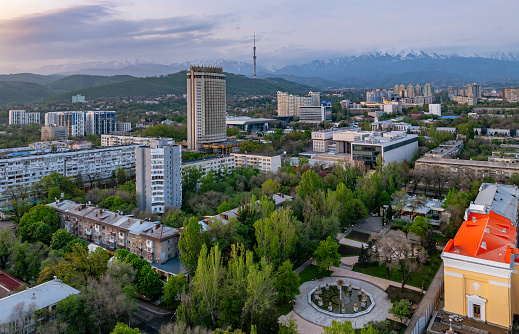 Scenic view from a quadcopter of the largest Kazakh city of Almaty in the early spring morning