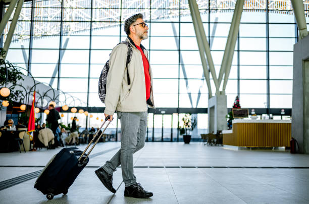 istock Mature man passenger at the train station 2150829886