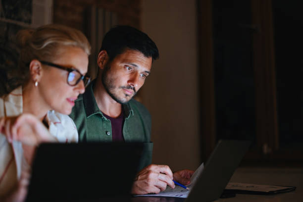 istock Businesspeople Working Late At Their Company 2150832191